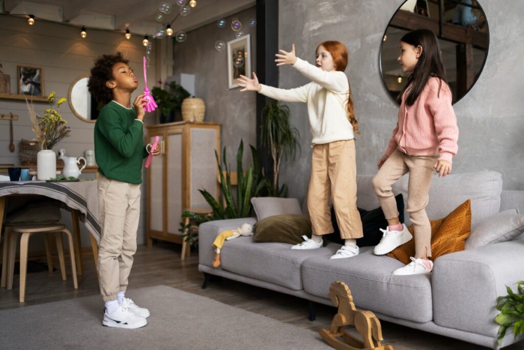 Climbing on their friend’s furniture