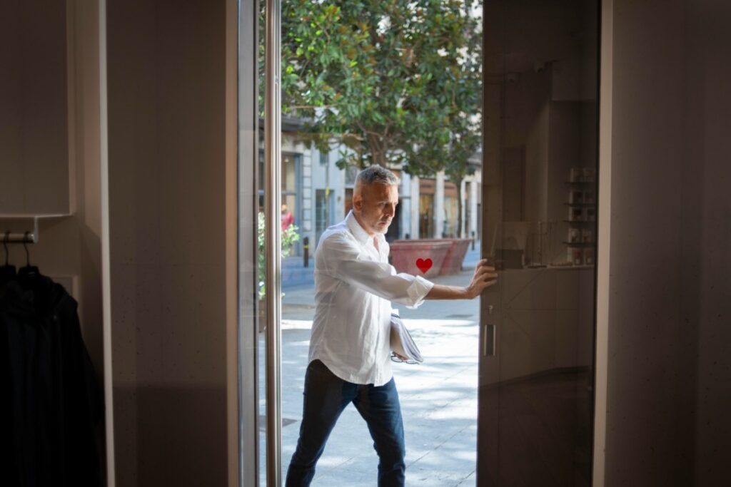 Holding doors for people far behind