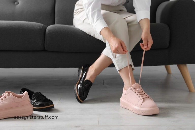 woman changing out of work shoes and into pink supportive footwear.