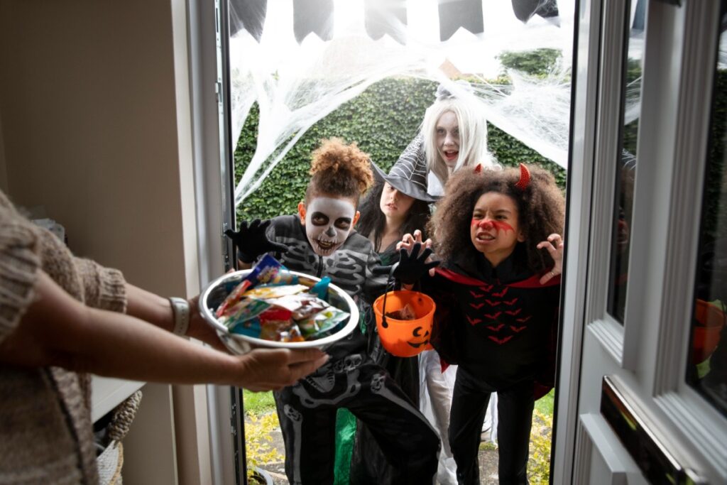 Taking candy from their friend’s Halloween stash