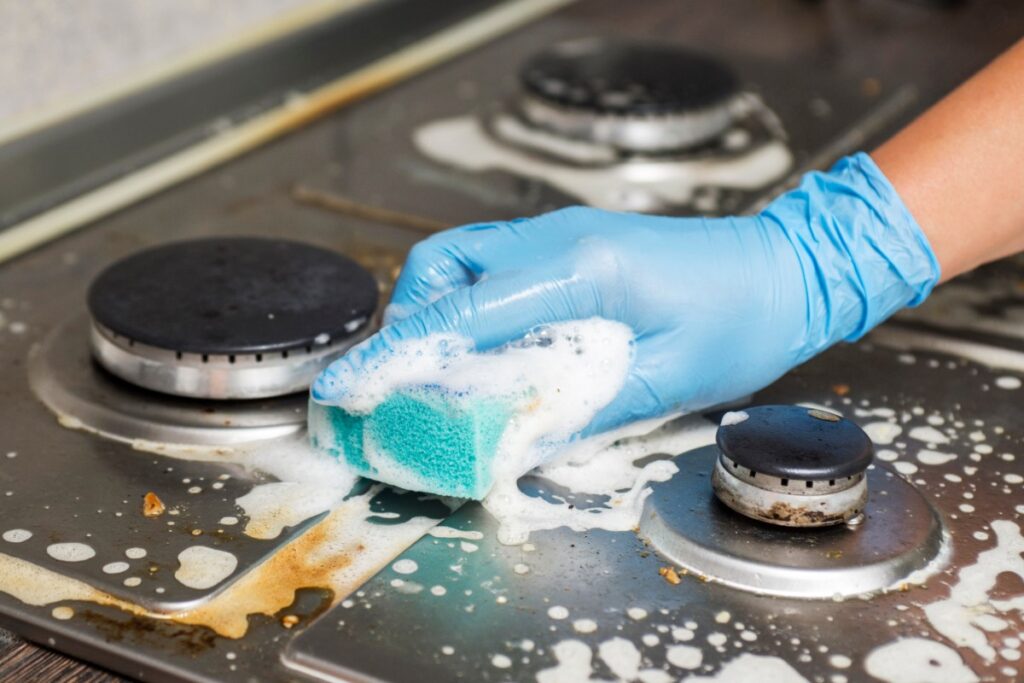 Using a dirty sponge to wipe surfaces