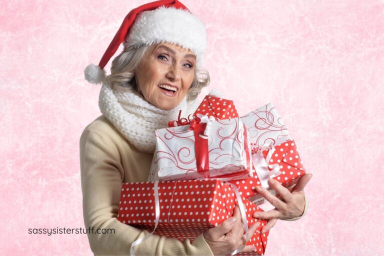 middle aged woman holding five senses gift ideas boxes for Christmas gifts.