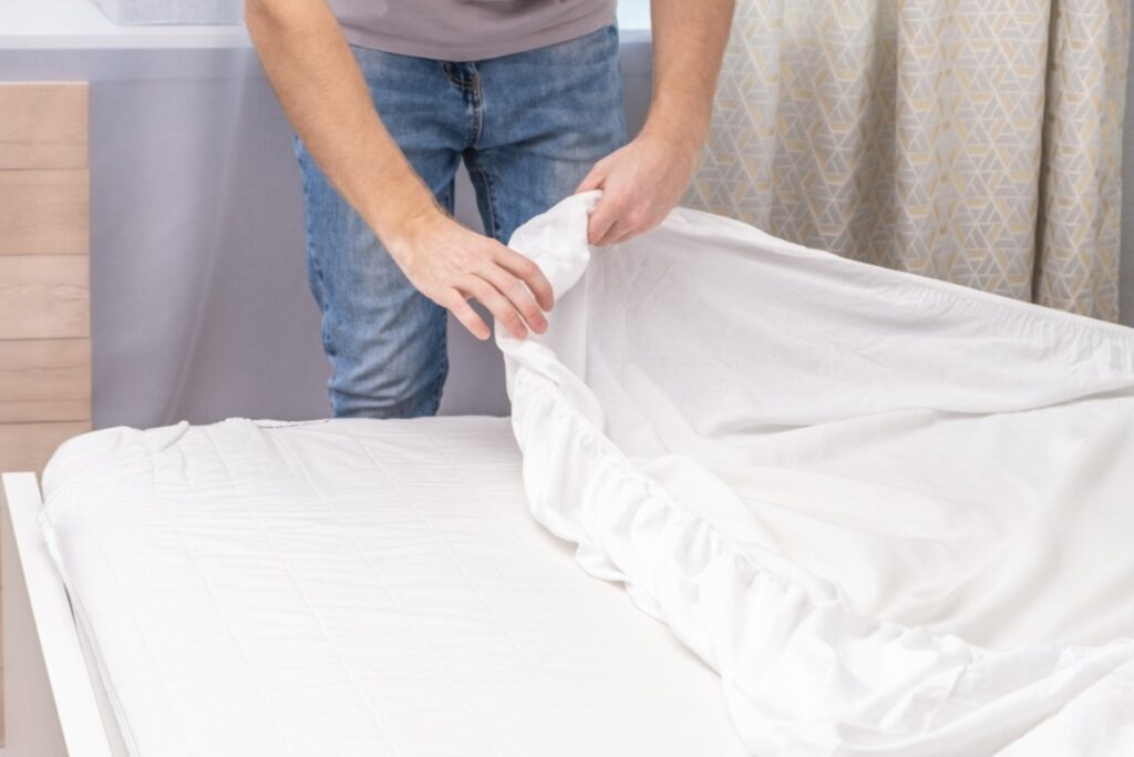 Changing bed sheets
