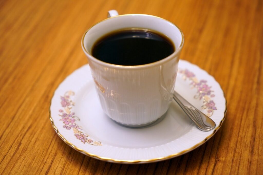 Decaf americano with triple vanilla syrup