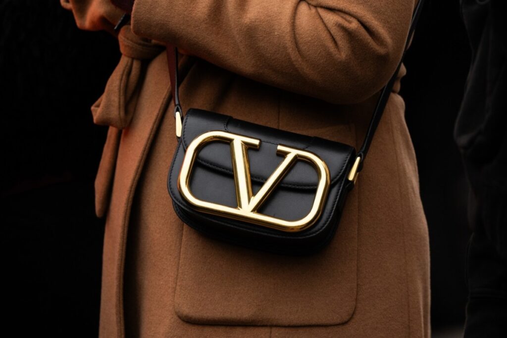 Designer handbags with oversized logos