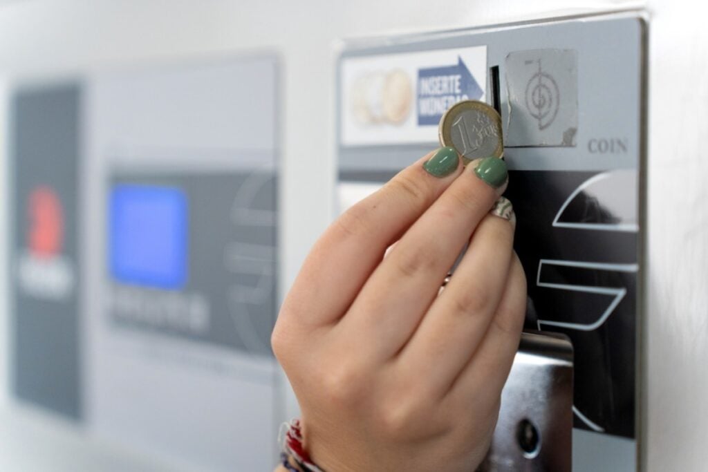 Dropping coins into the slot like you’re feeding a vending machine