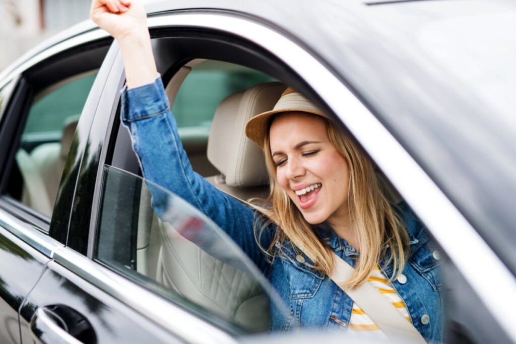 Having a private dance party in the driver's seat