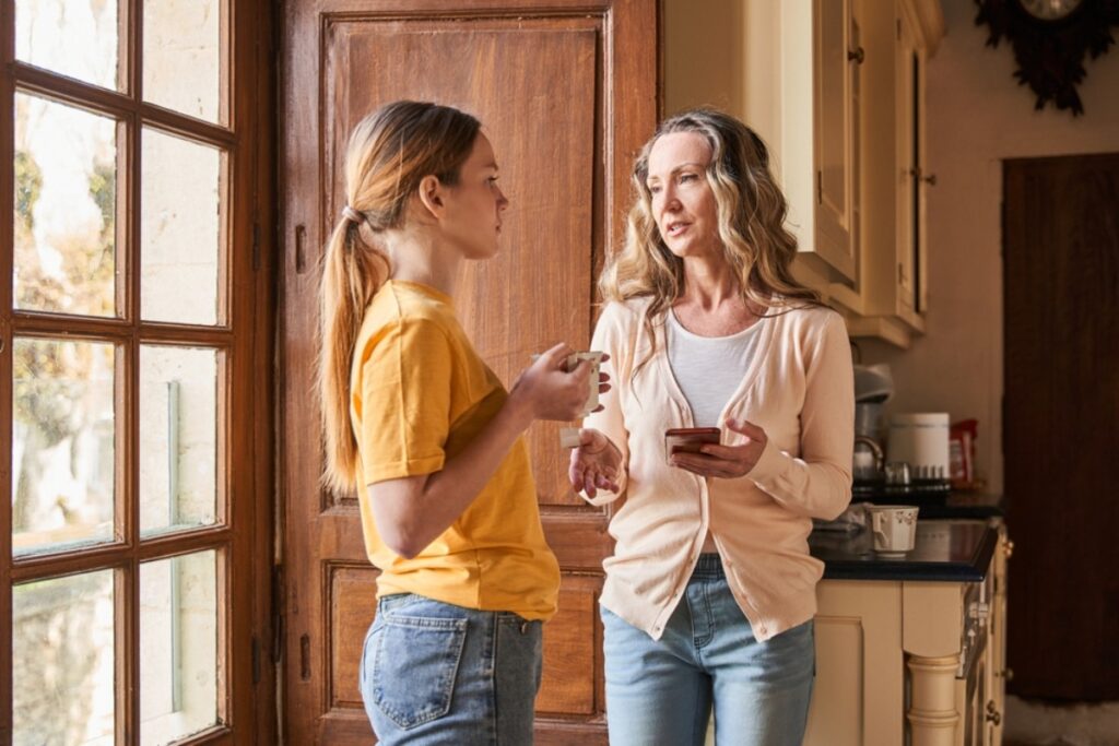 Hushed discussions on parenting styles and choices