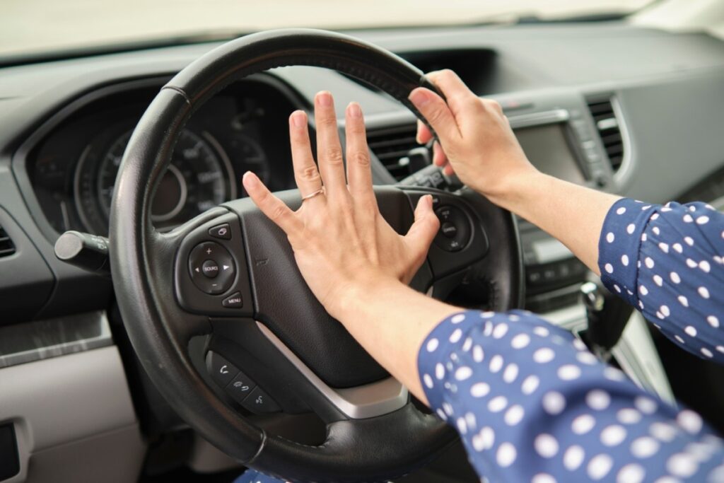 People blowing horns in traffic jams