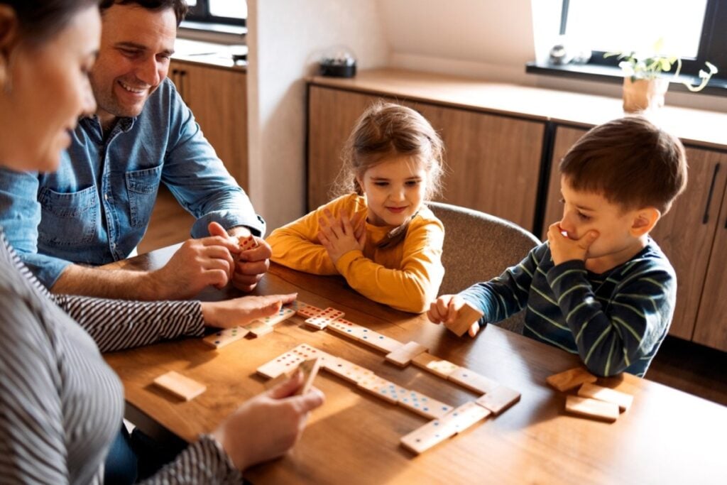 Playing board games with family or friends