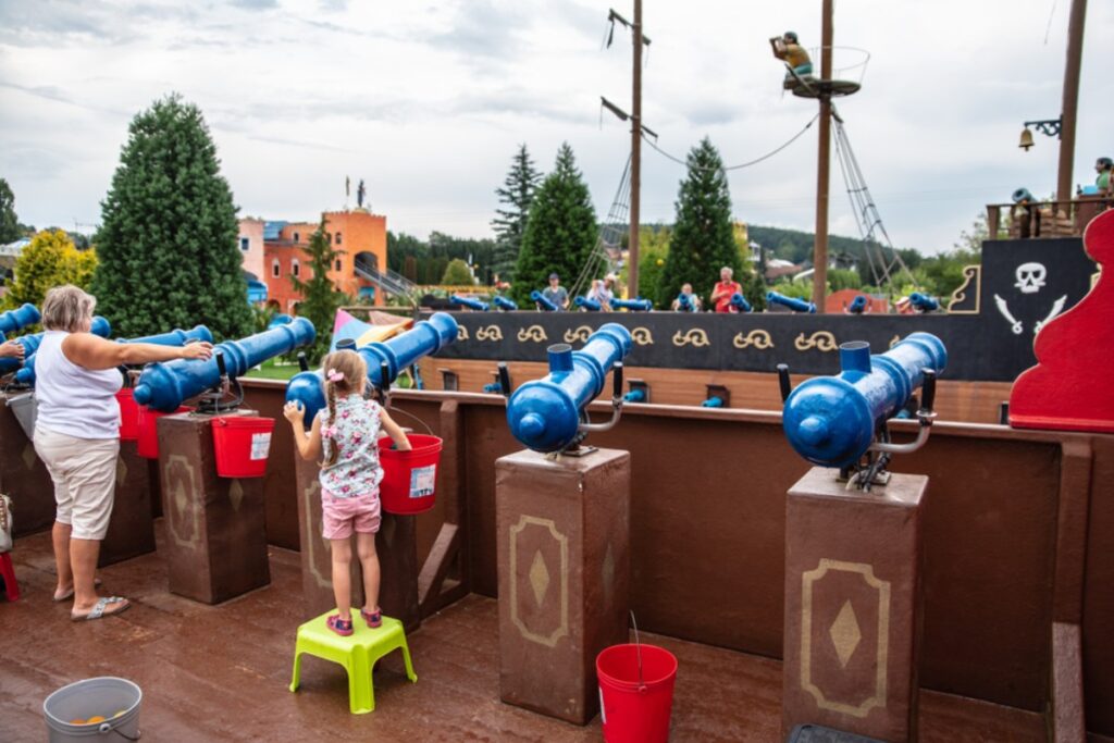 Riding Pirates of the Caribbean in both parks