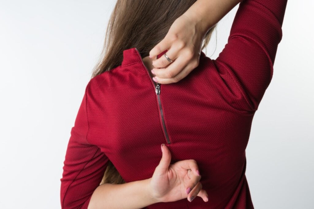 Secretly zipping up dresses to see if they fit properly