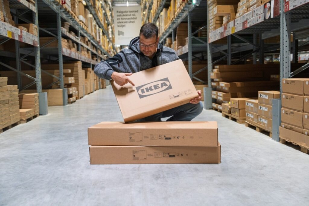 Spying on strangers assembling furniture in the aisles