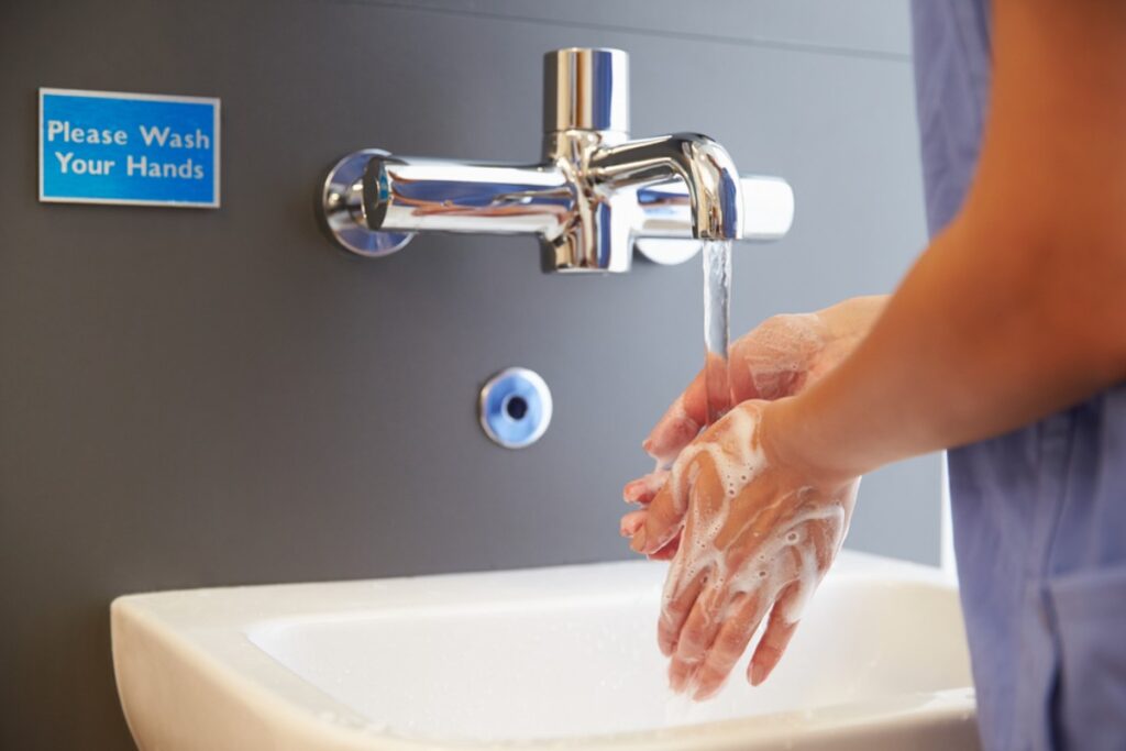 Talking to yourself quietly while washing hands