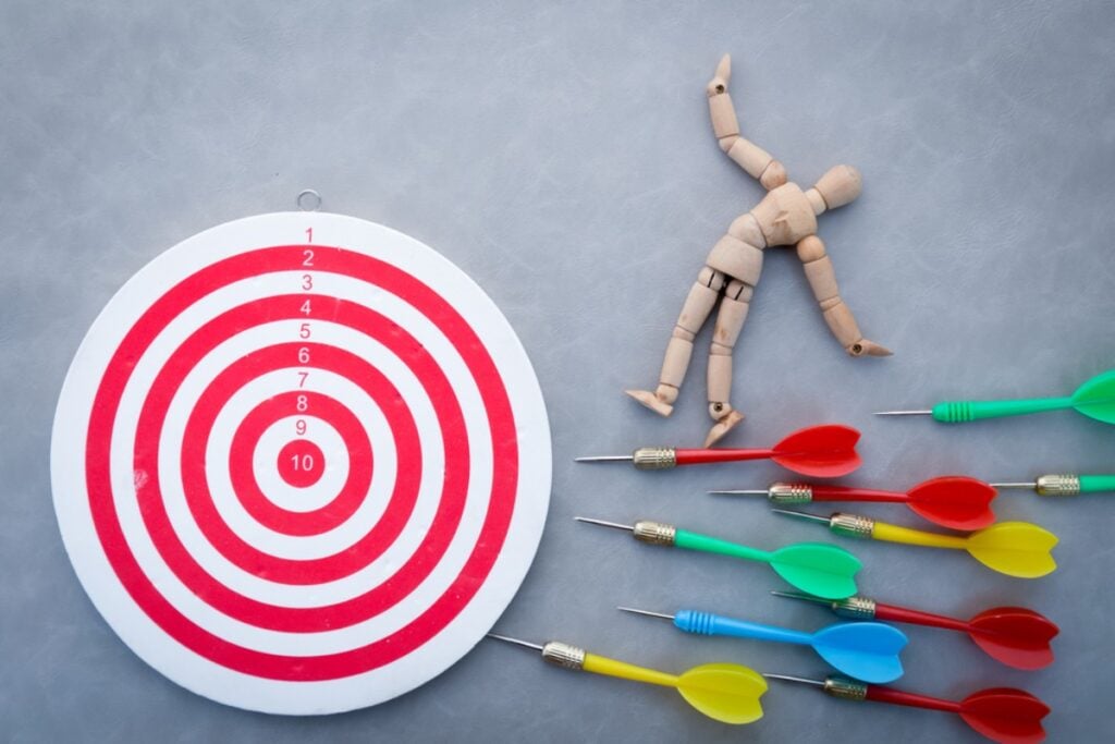 Toy lawn darts with sharp metal tips