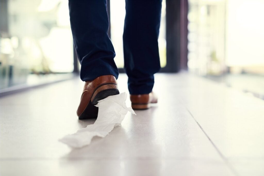 Walking out with toilet paper stuck to your shoe