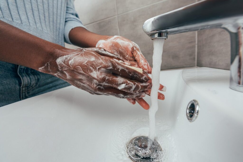 Washing hands multiple times to feel clean