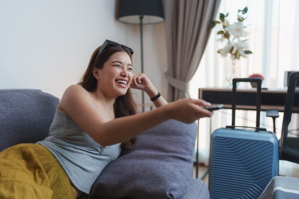 Watching cheesy TV shows no one admits to liking