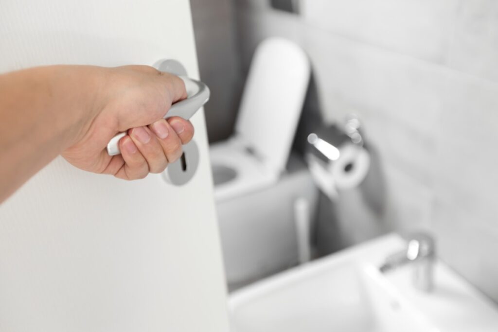 Watching for someone approaching before exiting quickly