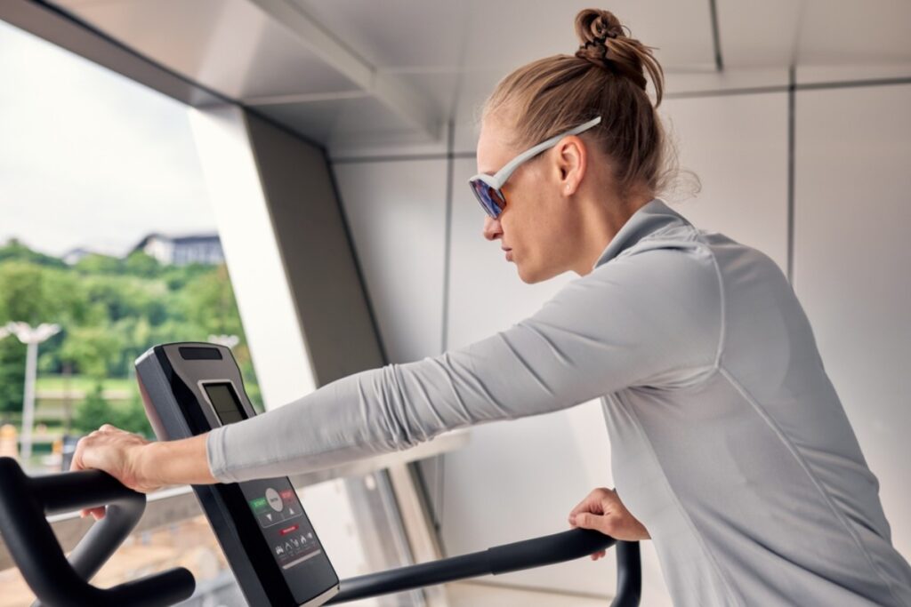 Wearing sunglasses indoors while working out