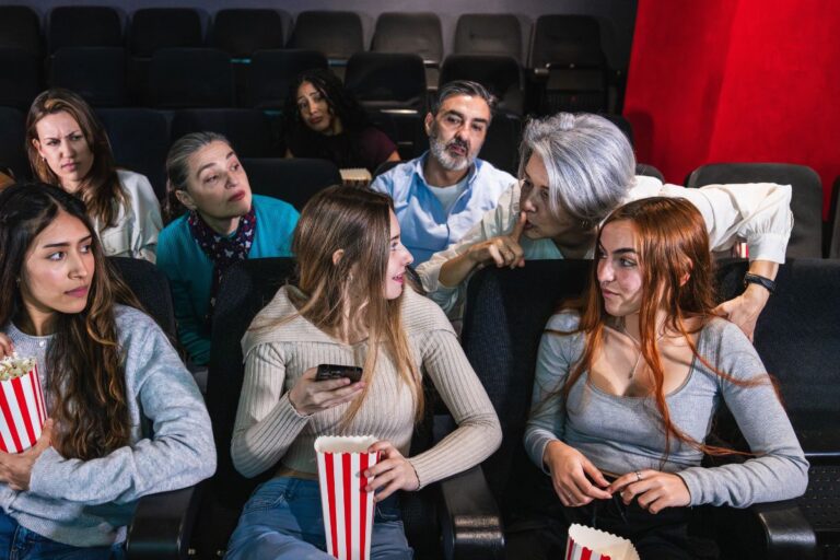 girls at the movies and an older lady asking them to be quiet -