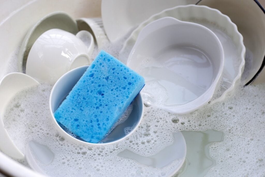 Cleaning sponges and cloths frequently to prevent bacteria