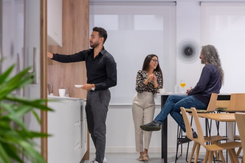 Disappearing in the kitchen during potlucks—ravenous but invisible