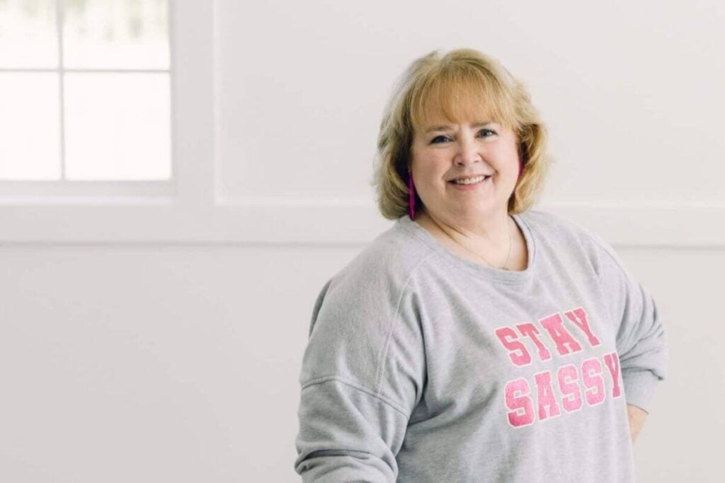 Writer of Finding My Styld After 50 models a casual outfit that says, Stay Sassy.