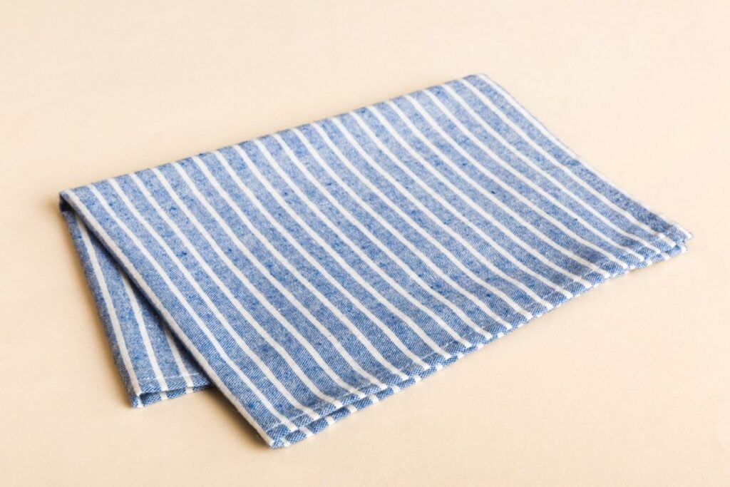 Flip kitchen towels into perfect triangles like origami