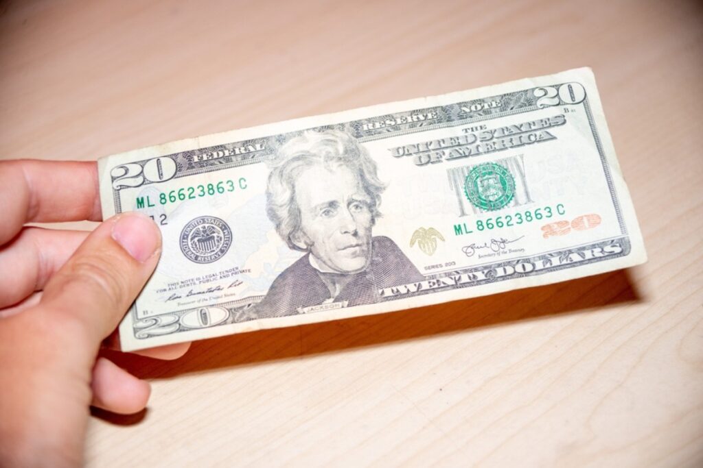 Folded $20 labelled 'Emergency Taco Fund'