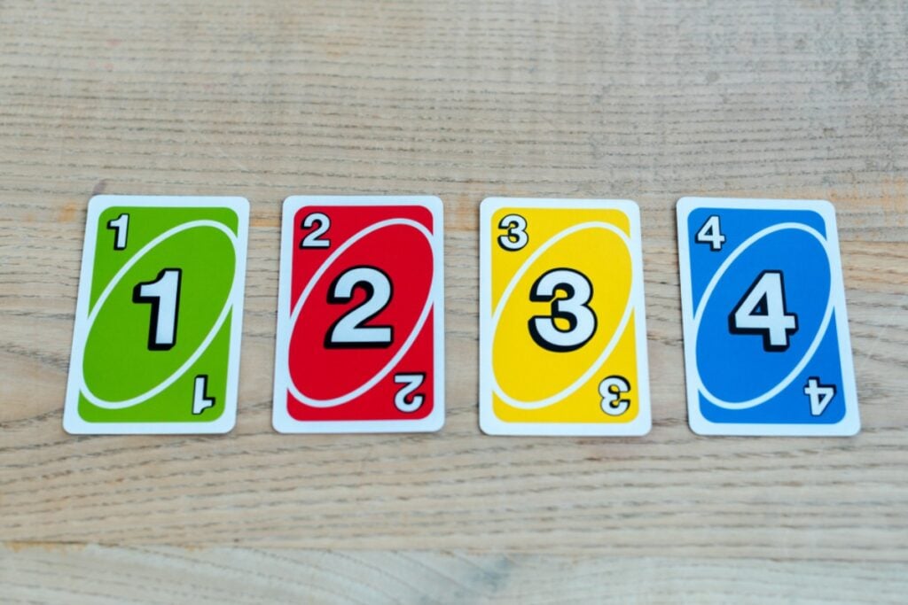 Half a deck of Uno cards missing the wild cards