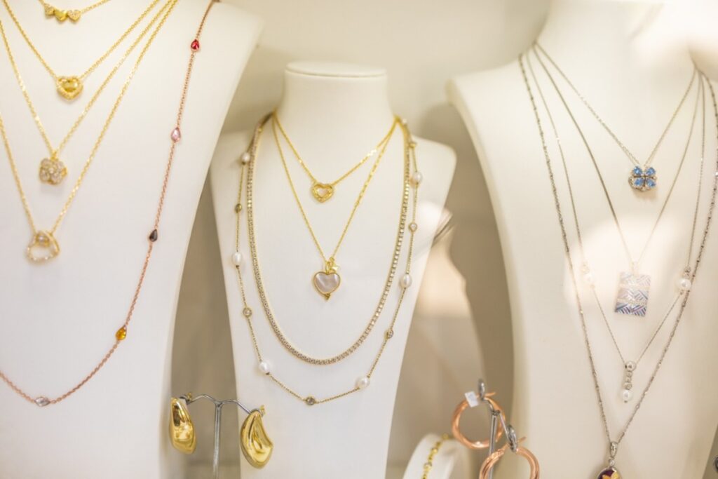 Layered delicate gold necklaces