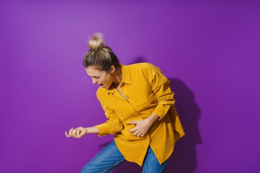 Playing air guitar with the microwave as your bandmate