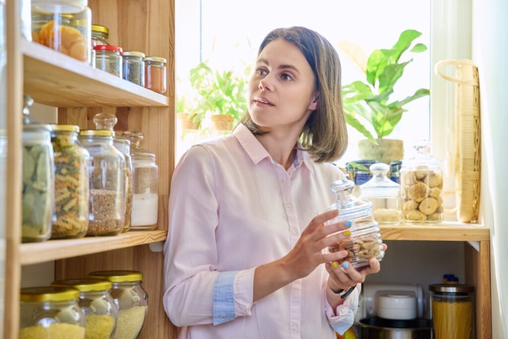 Rearrange spice jars by color spectrum—because neatness counts