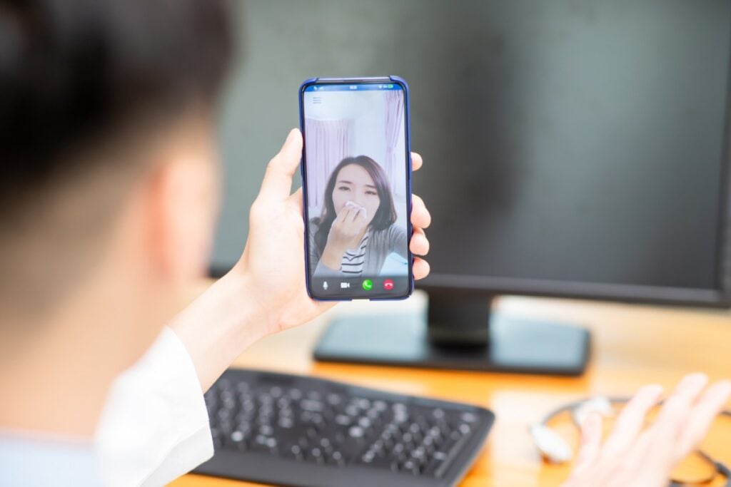 Secretly picking their nose like a stealth ninja