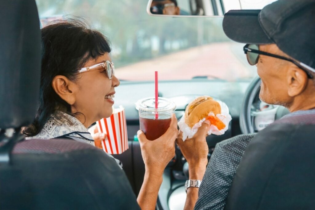 Secretly swapping movie snacks when nobody's looking