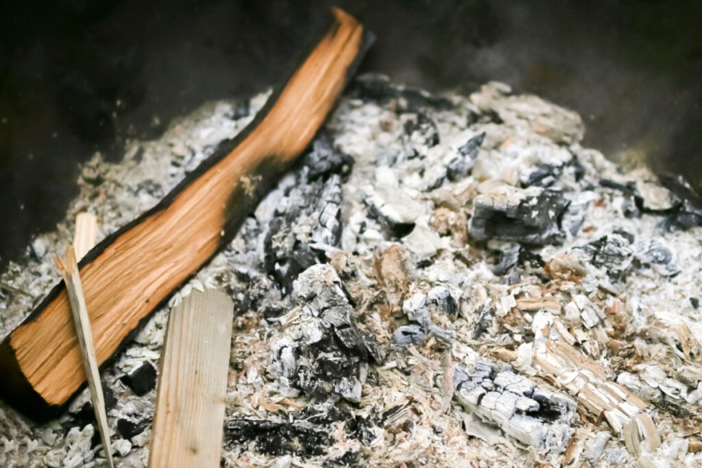 Sweeping ashes from wood stoves