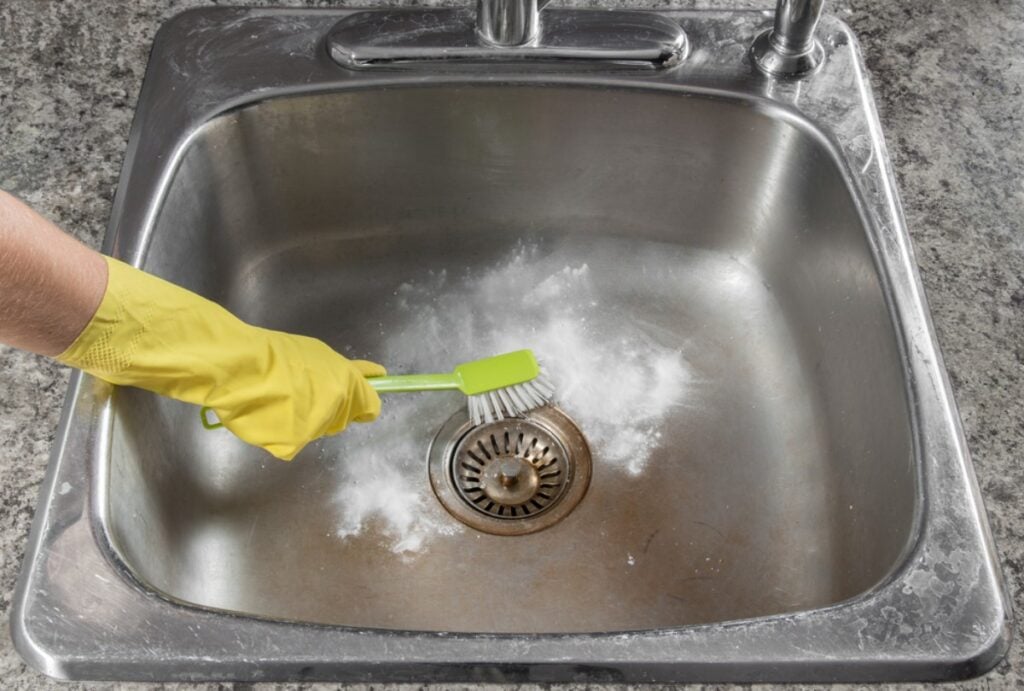 Tackle grout lines with a toothbrush and a paste of baking soda and hydrogen peroxide.