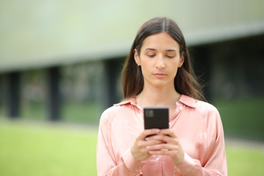 Try to look busy by pulling out fictional emails on your phone