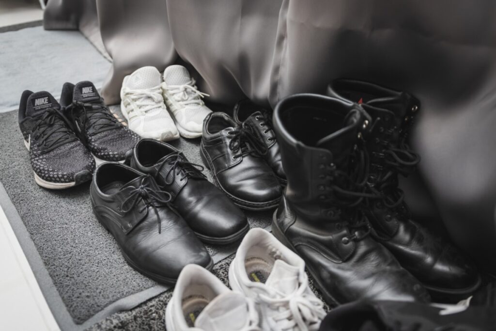 Shoes scattered by the door