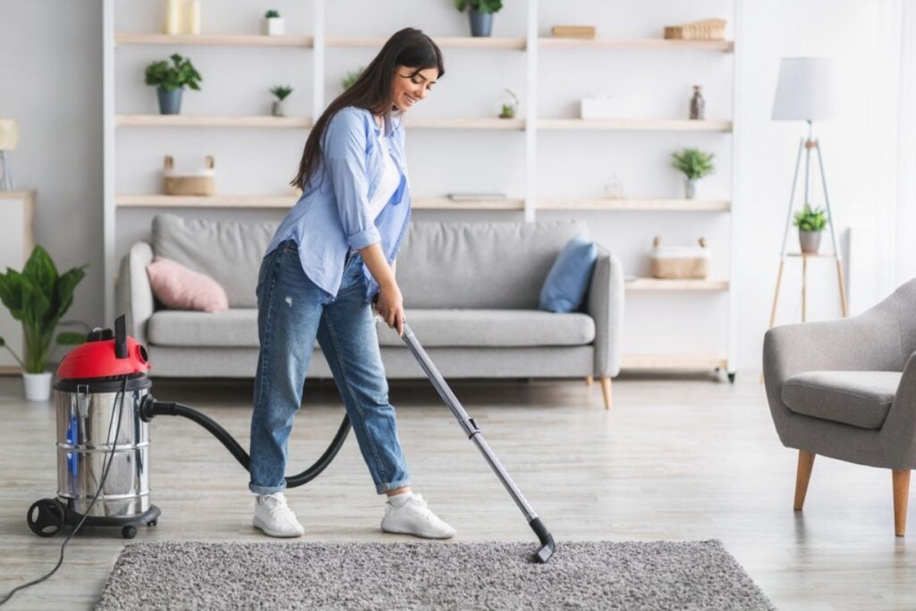 Sprinkle baking soda on carpets before vacuuming to lift odors and refresh fibers.