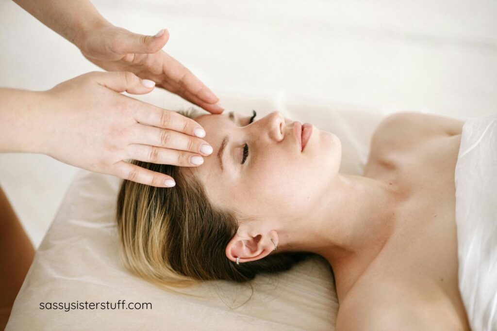 young midlife woman shows how to add massage to your wellness routine.