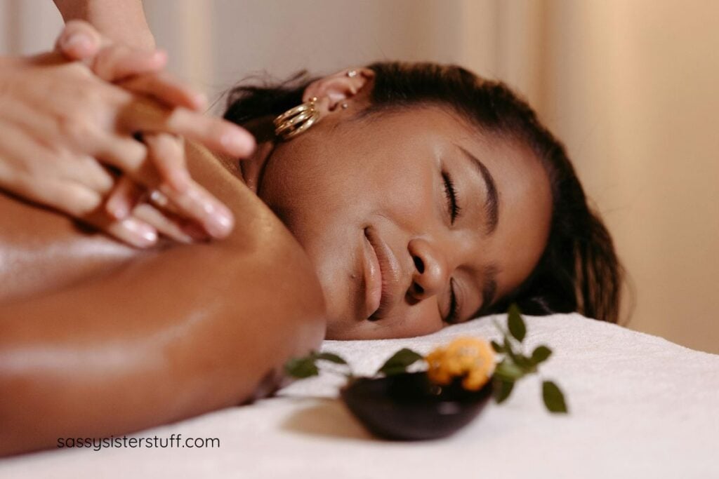 beautiful African American woman gets a massage.