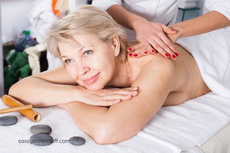 midlife woman shows how to add massage to your wellness routine.