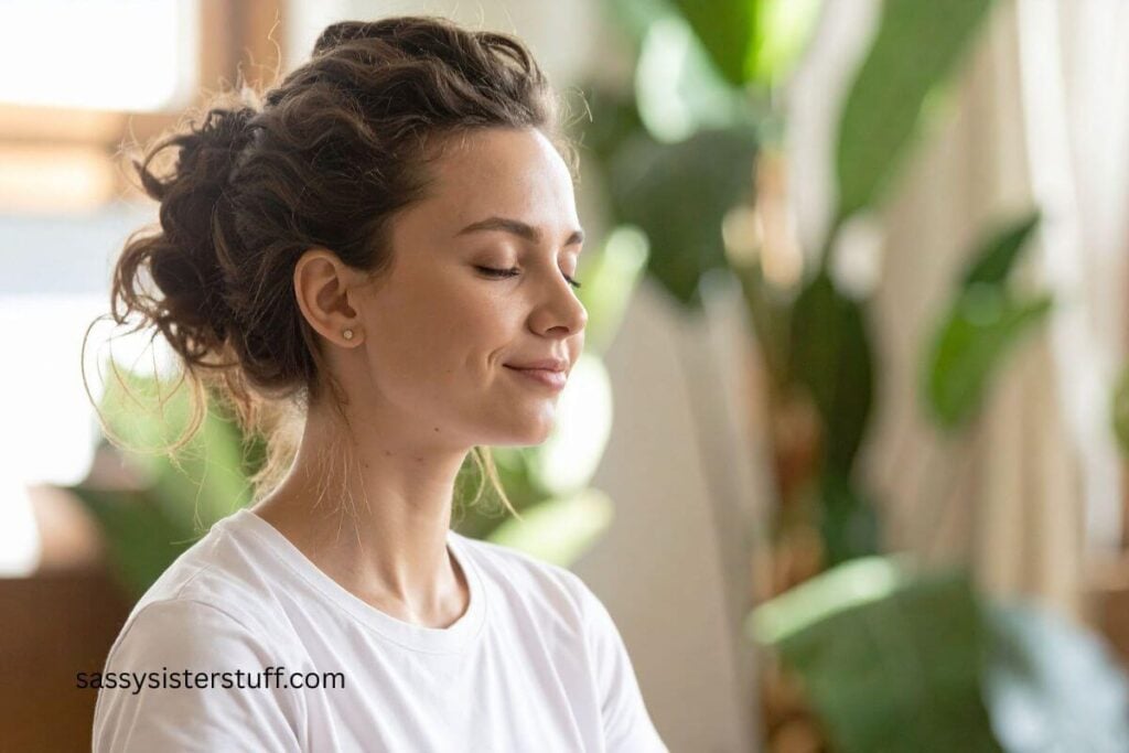 midlife woman sitting quietly with her eyes closed as part of her simple routines for steadiness when you spiral in midlife.