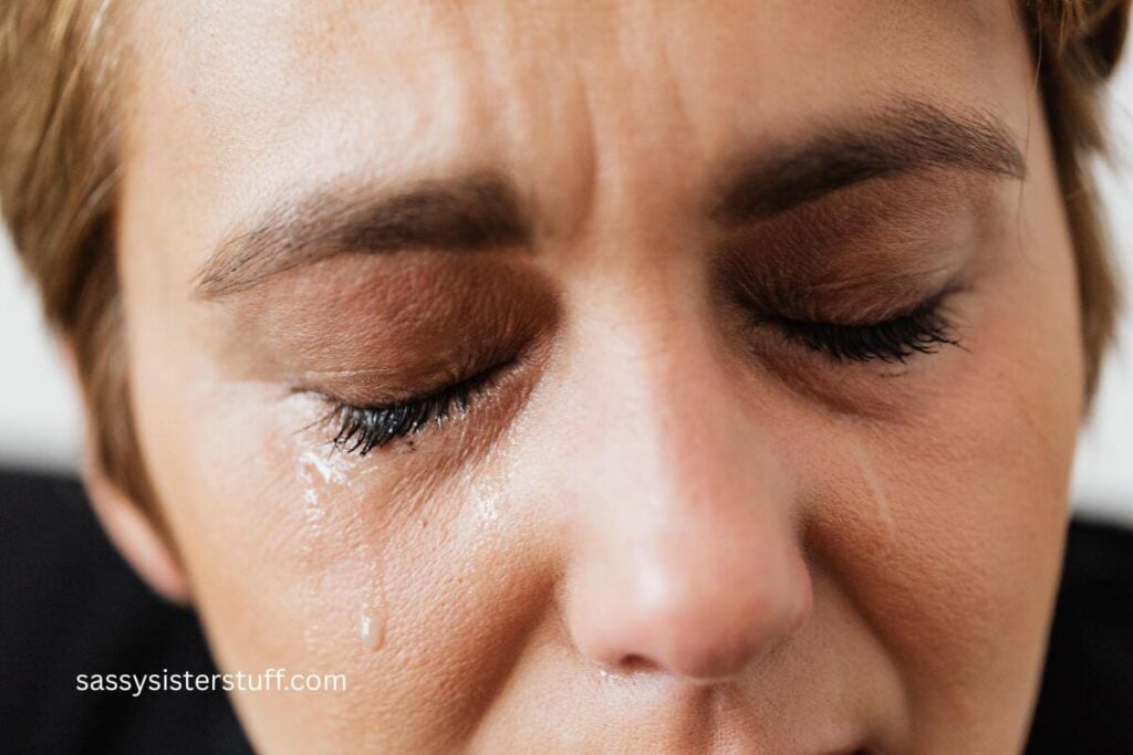 close-up of midlife woman in tears because she feels her life is out of control.