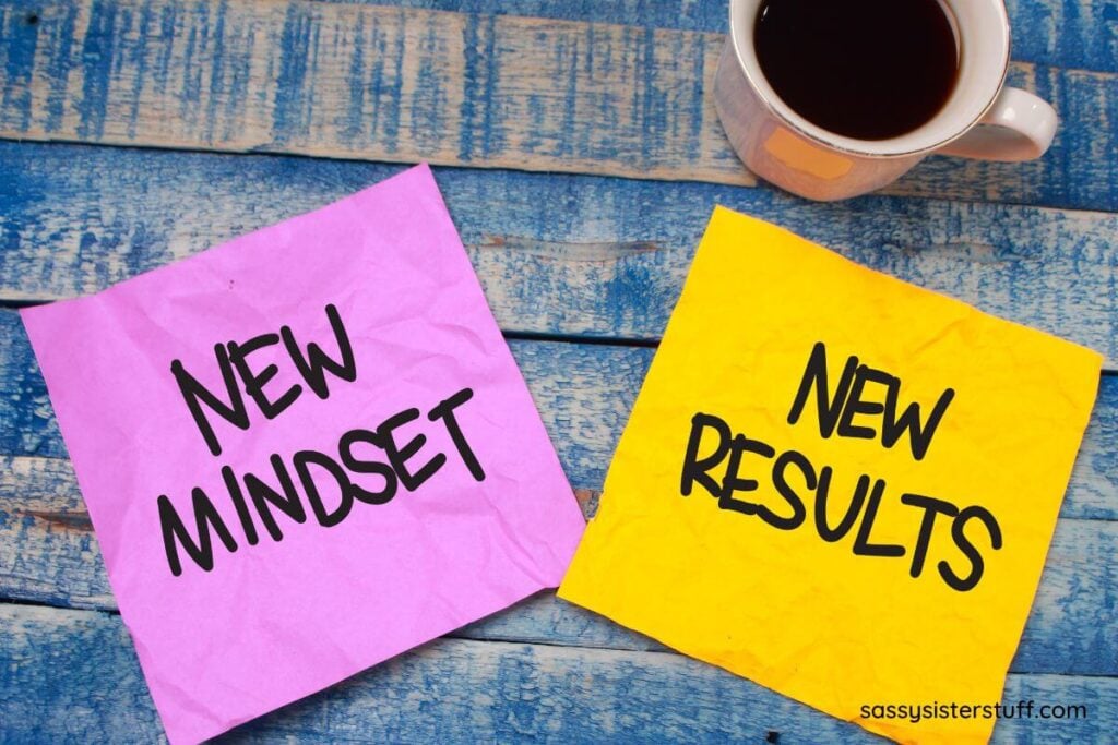 top view of two sticky notes and a cup of coffee.