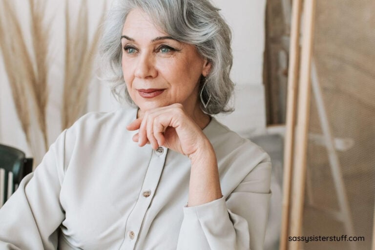 woman over 50 pondering growth mindset phrases.