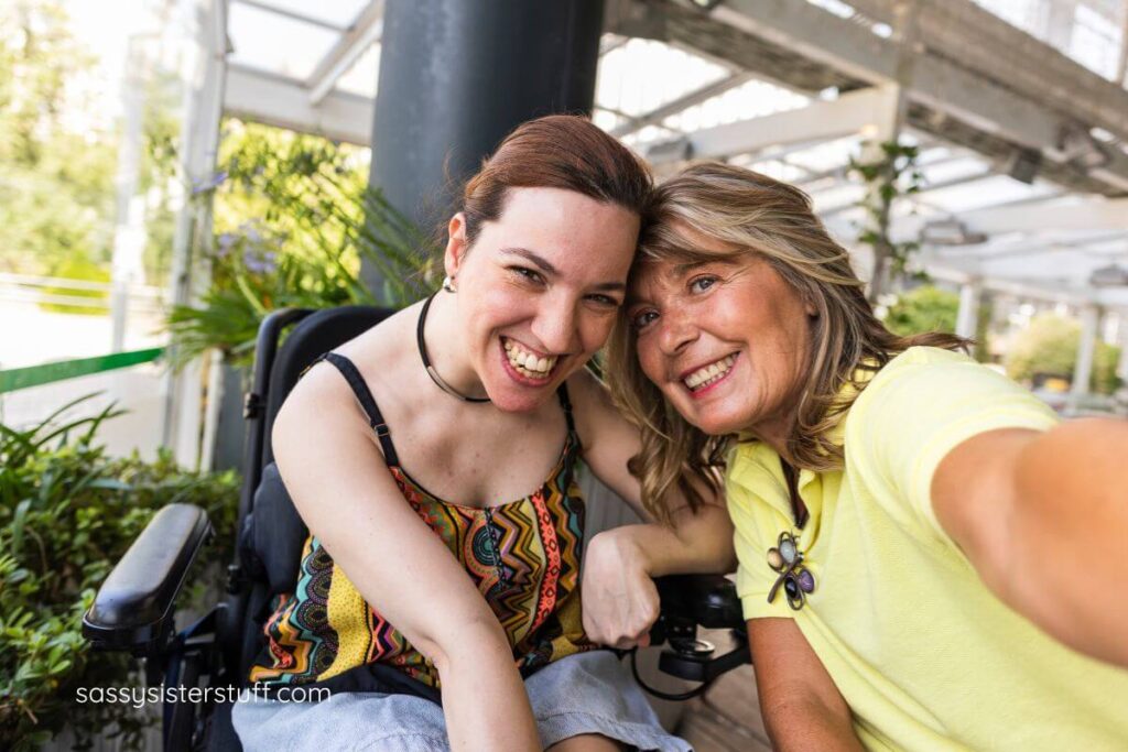 two midlife women cheerfully take a selfie as they make each day more joyful.