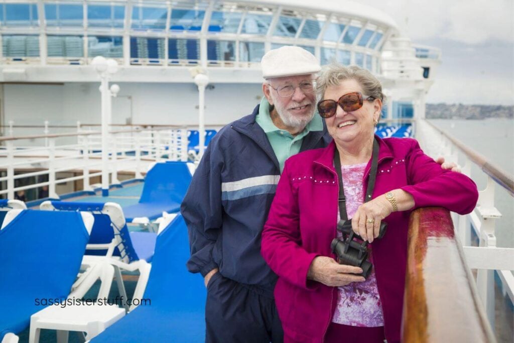 grandparents on a deck of a cruise ship.